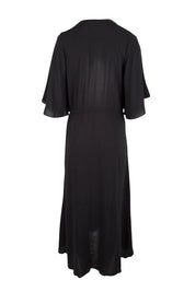 Product shot of the Saint Lucia Dress in colour Black (Black), from the back