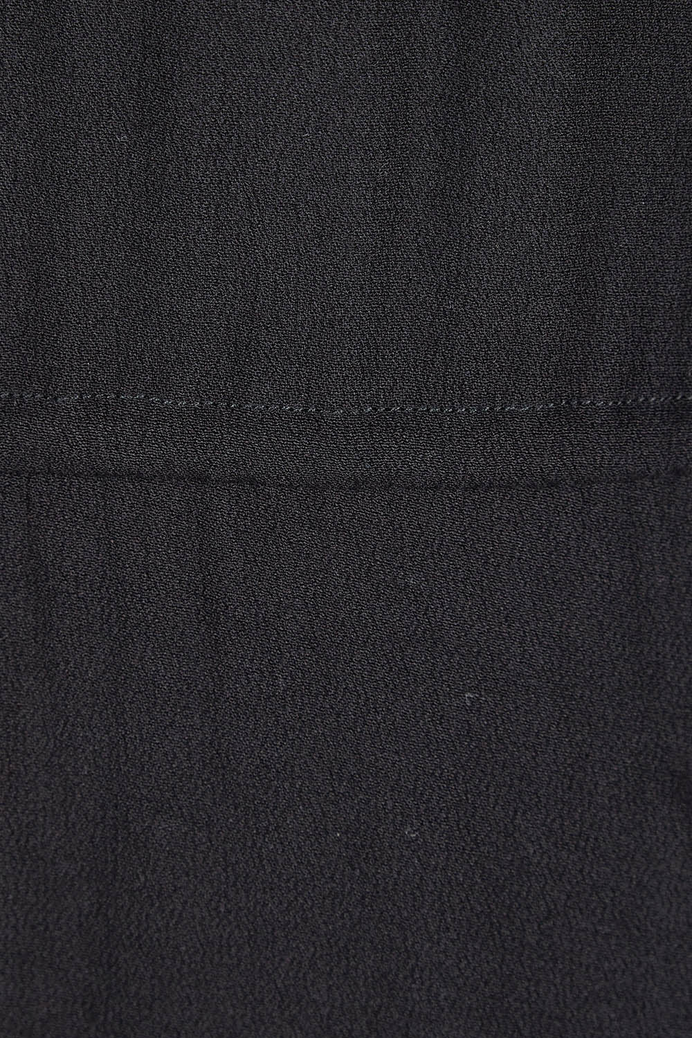 Product shot of the Saint Lucia Dress in colour Black (Black), detail