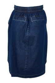 Product shot of the Desiree Cotton Denim Skirt in colour Bluewash (Blue), from the back