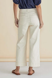 A model wearing the Willow Wide Leg Jean in colour Offwhite (White), from the back