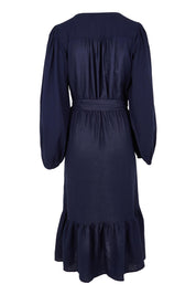 Product shot of the Melissa Dress in colour Darkblue (Blue), from the back