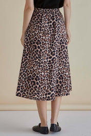 A model wearing the Sirah Cotton Skirt in colour Leopard, from the back