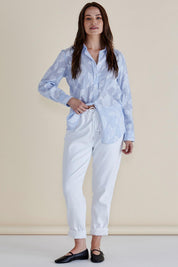 A model wearing the Lace Stripe Cotton Shirt in colour Lacefloral (Blue), from the front, showing the whole outfit