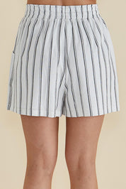 A model wearing the Sierra Short in colour Blkwhite (White), from the back