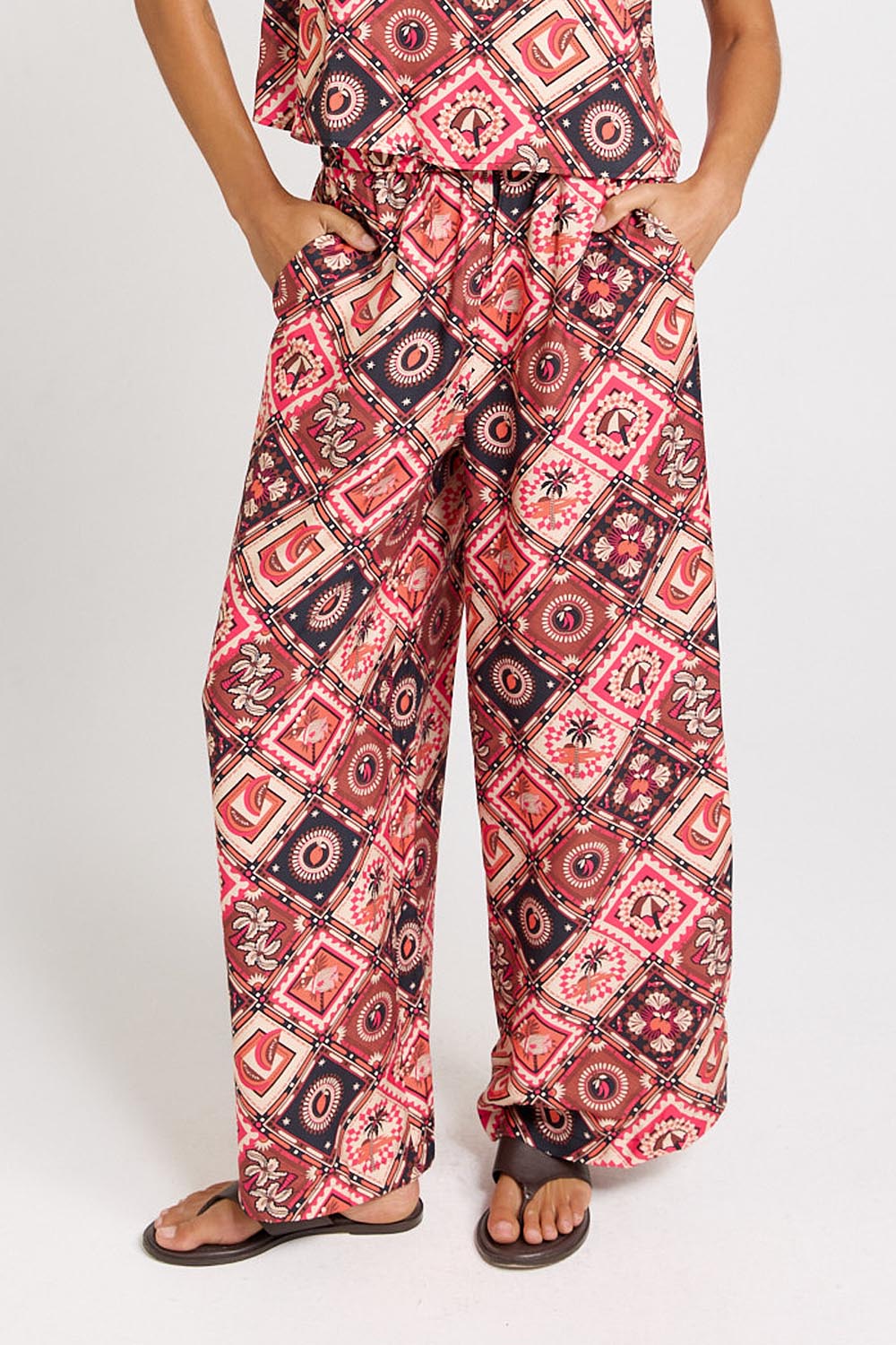 Model Genericm wearing size sample of the Sable Wide Leg Pant – Coco in colour Coco, in a cropped view