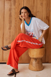 Model Genericm wearing size sample of the Sable Wide Leg Pant – Red in colour Red, from the front