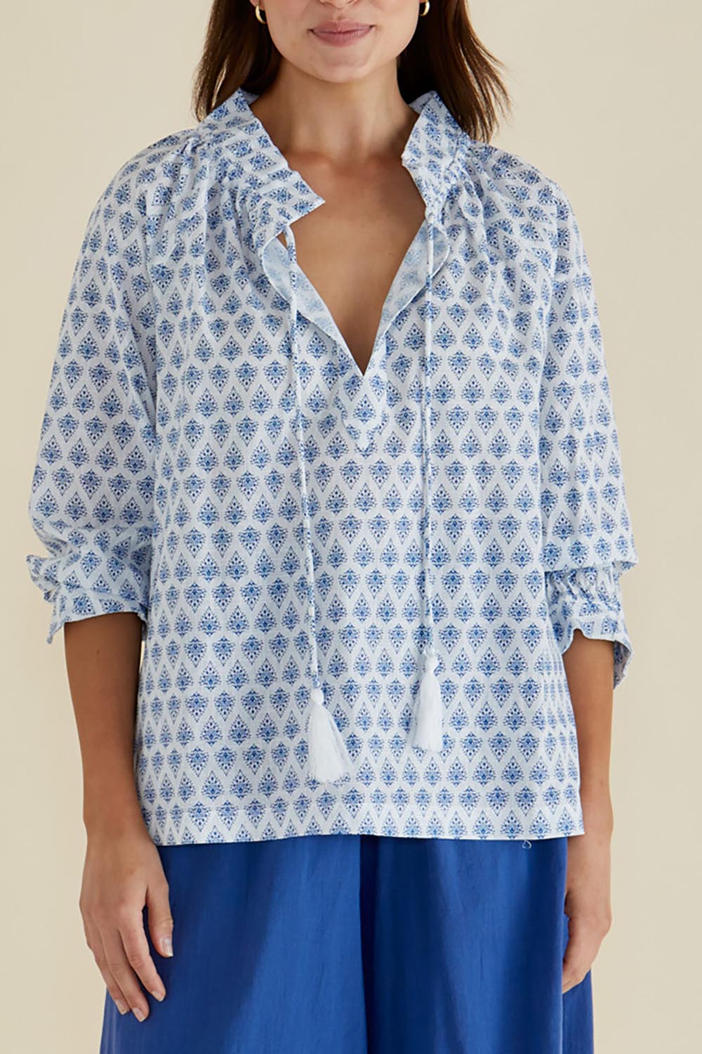 A model wearing the Charli Cotton Blouse in colour Blue (Blue), from the front, cropped image