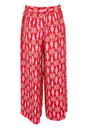 Product shot of the Copacabana Relax Pant in colour Sardinia (Red), from the back