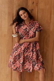 Model Genericm wearing size sample of the Copacabana Shirt Dress – Coco in colour Coco, in a cropped view