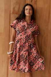 Model Genericm wearing size sample of the Copacabana Shirt Dress – Coco in colour Coco, in a cropped view