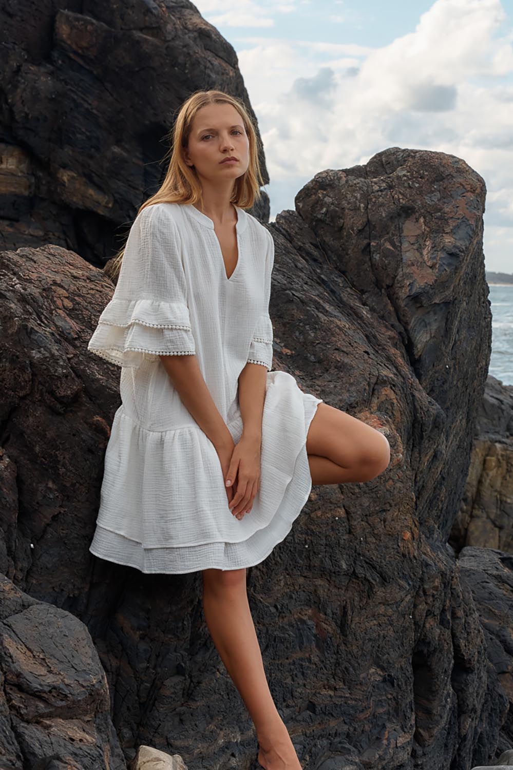 A model wearing the Malibu Cotton Dress in colour White (White), from the front, showing the whole outfit