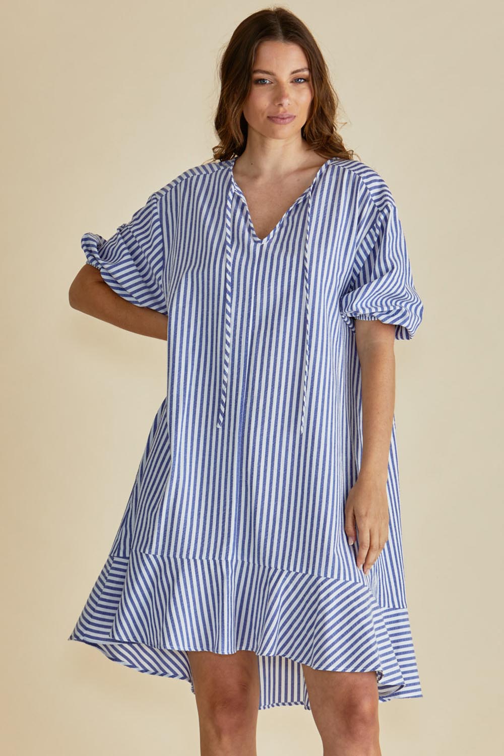 A model wearing the Livvy Cotton Blend Dress in colour Navystripe (Blue), from the front, cropped image