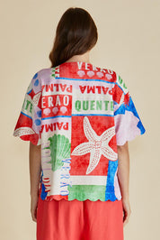 A model wearing the Scarlett Shirt in colour Seashell, from the back