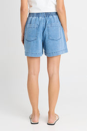 Model Genericm wearing size sample of the Quinn Cotton Short – Bluemed in colour Bluemed, from the front