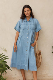 Model Genericm wearing size sample of the Willow Denim Dress – Medwash in colour Medwash, from the front