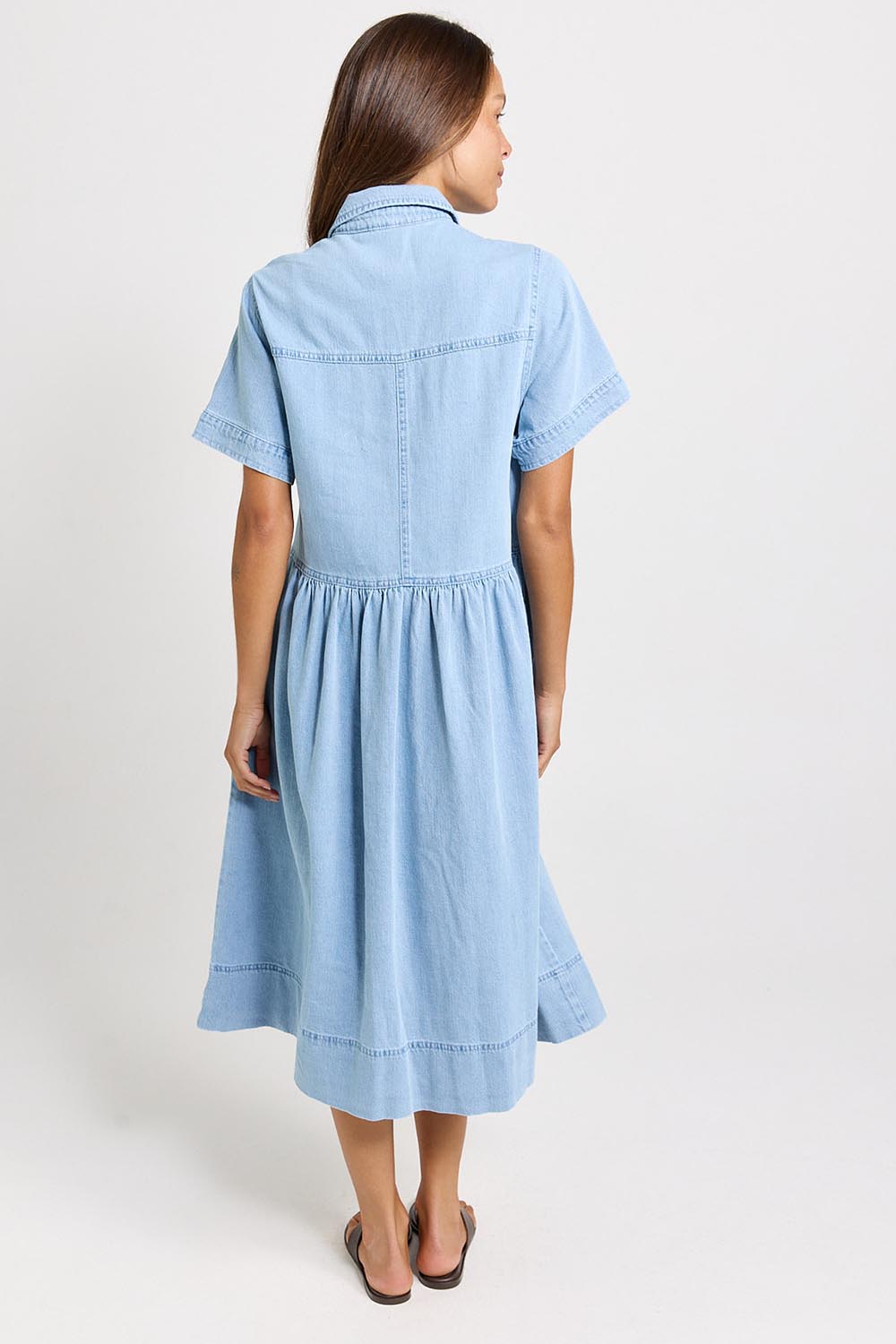 Model Genericm wearing size sample of the Willow Denim Dress – Medwash in colour Medwash, from the front