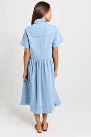 Model Genericm wearing size sample of the Willow Denim Dress – Medwash in colour Medwash, from the front
