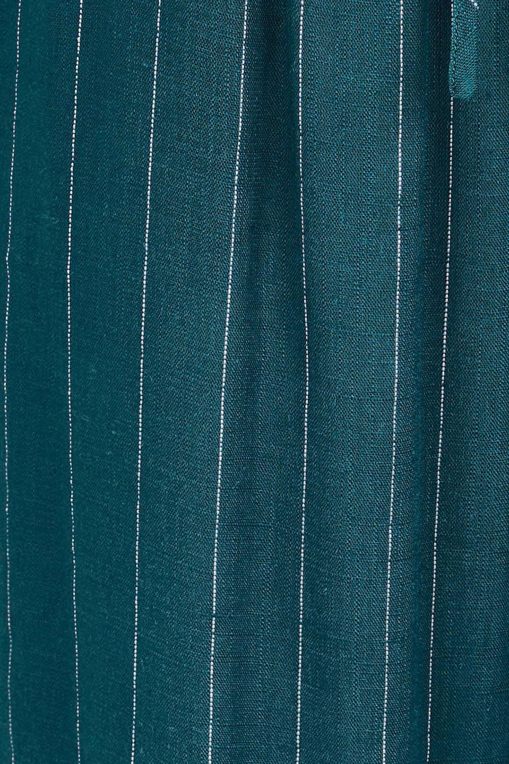 Product shot of the Palm Relax Pants – Teal in colour Teal, showing detail