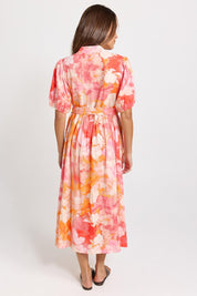 Model Genericm wearing size sample of the Nia Dress – Floral in colour Floral, from the front