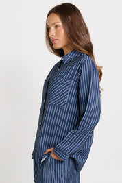 Model Genericm wearing size sample of the Sorrento Shirt – Blue in colour Blue, from an angle