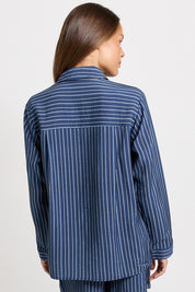 Model Genericm wearing size sample of the Sorrento Shirt – Blue in colour Blue, from the back