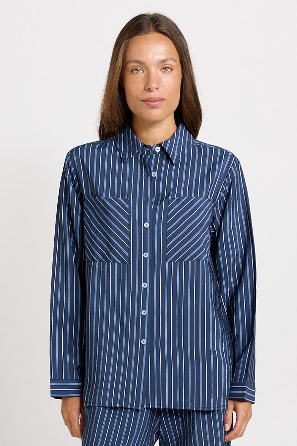 Model Genericm wearing size sample of the Sorrento Shirt – Blue in colour Blue, in a cropped view