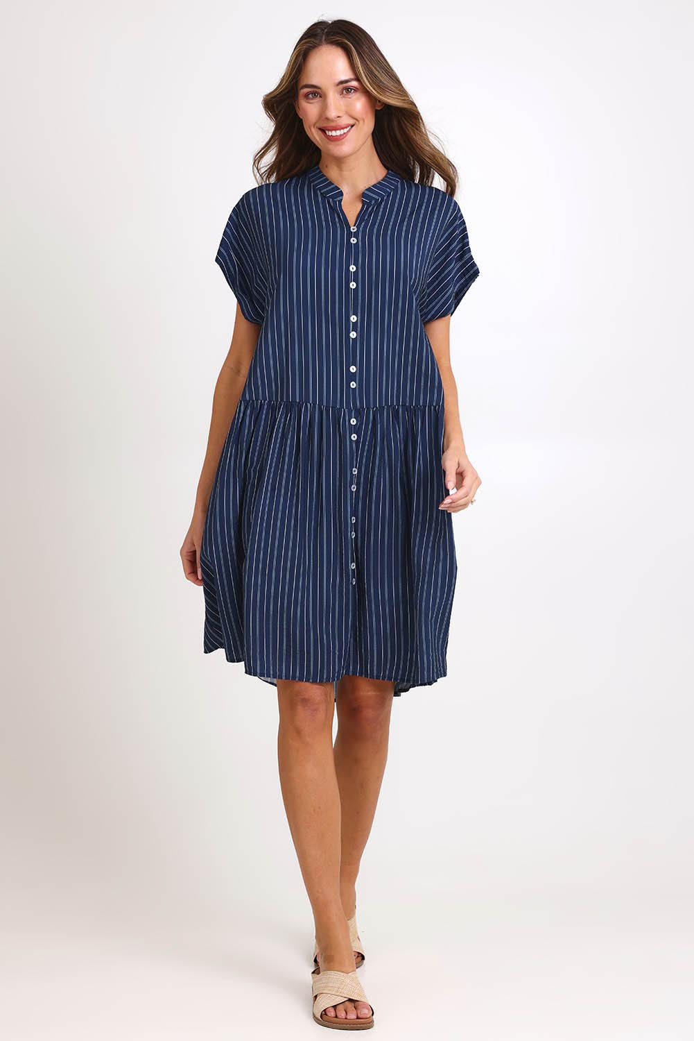 Model Madelinec wearing size 10 of the Sandy Dress – Blue in colour Blue, from the front