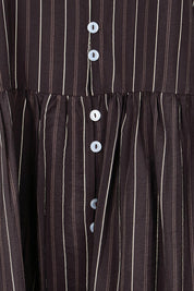 Product shot of the Sandy Dress – Brown in colour Brown, showing detail