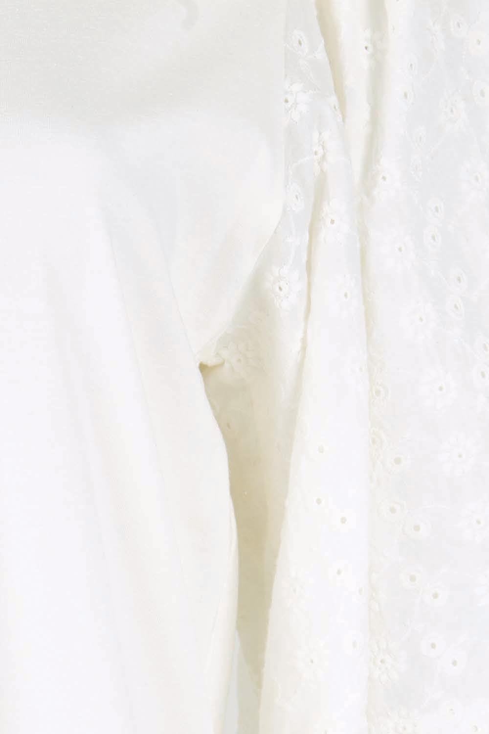 Product shot of the Bianca Broderie T-Shirt – White in colour White, showing detail