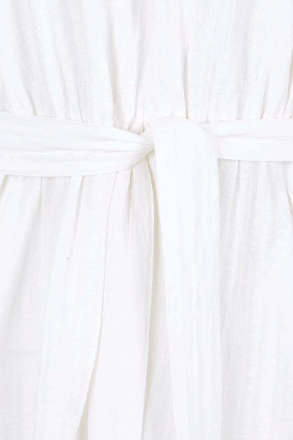 Product shot of the Daisy Broderie Dress - White in colour White, showing detail