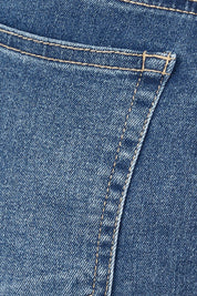Product shot of the Bonnie Bermuda Denim Short in colour Indigo (Blue), detail