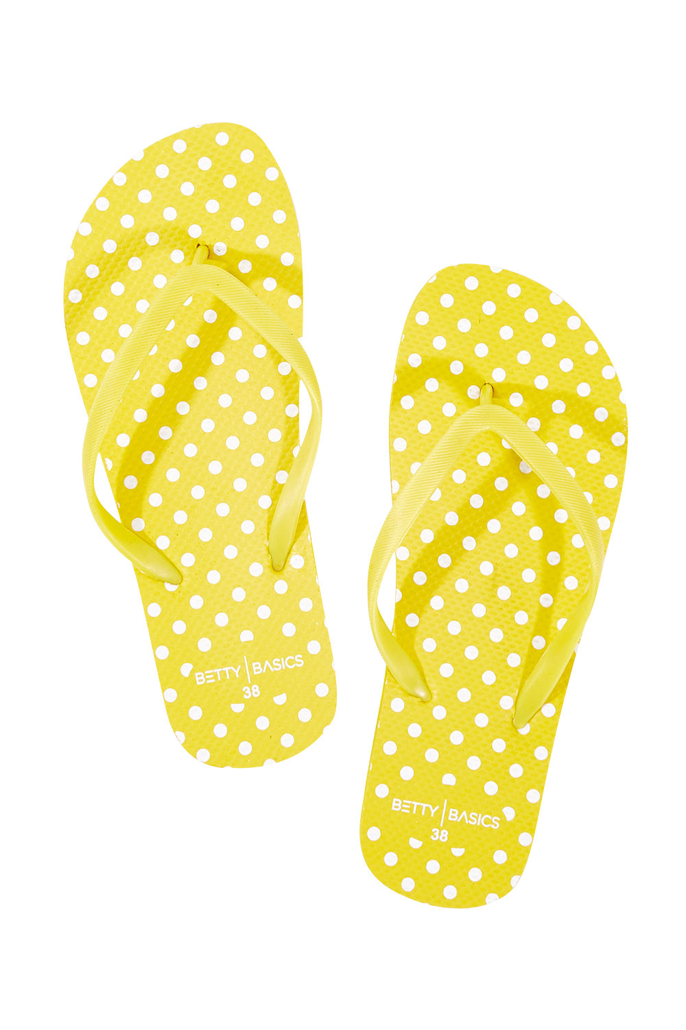 Product shot of the Nomad Thongs in colour Yellow, from the front