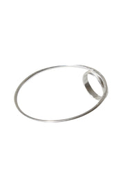 Product shot of the Brass Oversize Circle Ring in colour Silvbrass (Metallics), from the front