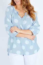 Model Laura wearing size 14 of The Stitch Detail Blouse in colour Chambspot (Blue), from the front, cropped image