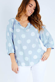 Model Laura wearing size 14 of The Stitch Detail Blouse in colour Chambspot (Blue), from the front, cropped image