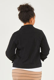 Model Noli wearing size 14 of The Denim Jacket in colour Black (Black), from the back