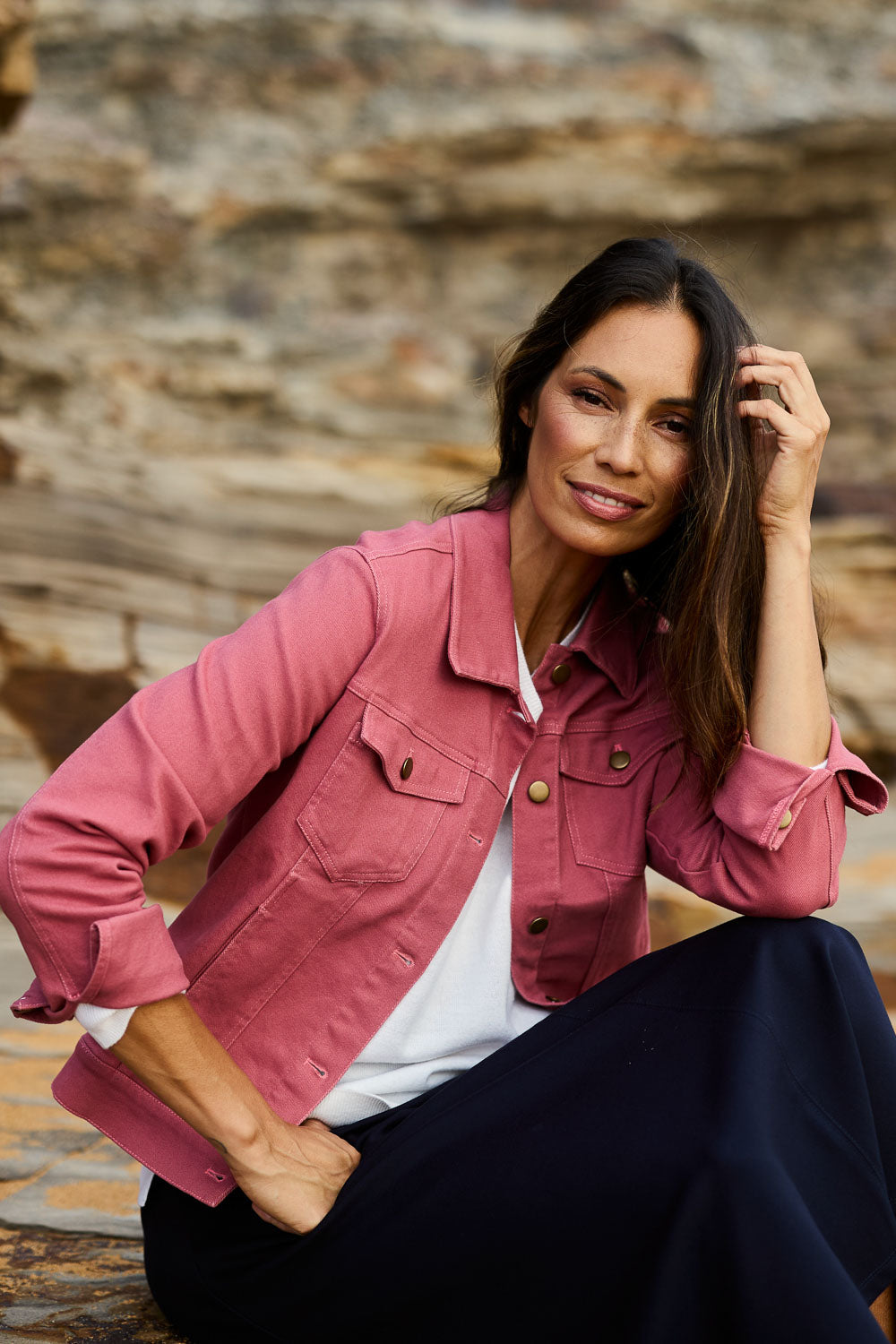 Model Amanda wearing size 10 of The Denim Jacket in colour Smokeyrose (Pink), from the front, showing the whole outfit