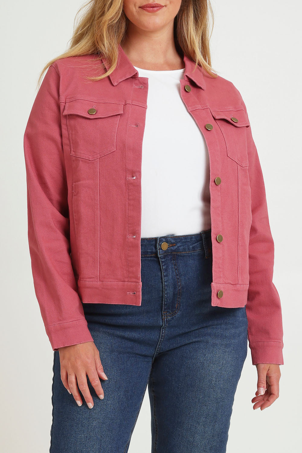 Model Chanel wearing size 16 of The Denim Jacket in colour Smokeyrose (Pink), from the front, cropped image
