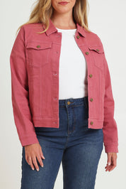 Model Chanel wearing size 16 of The Denim Jacket in colour Smokeyrose (Pink), from the front, cropped image