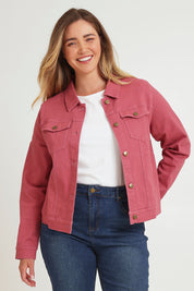 Model Chanel wearing size 16 of The Denim Jacket in colour Smokeyrose (Pink), from the front, cropped image