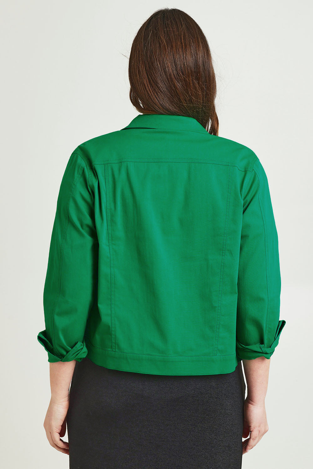 Model Jane wearing size 14 of The Tencel Blend Denim Jacket in colour Emerald (Green), from the back