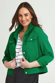 Model Jane wearing size 14 of The Tencel Blend Denim Jacket in colour Emerald (Green), from the front, cropped image
