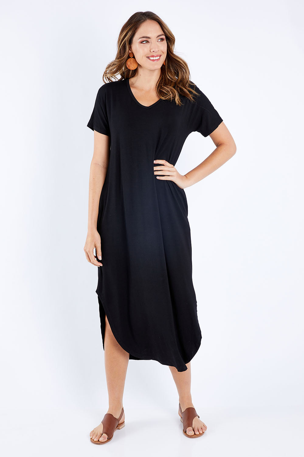 Model Madeline wearing size 10 of The Cotton Blend Maxi in colour Black (Black), from the front, showing the whole outfit
