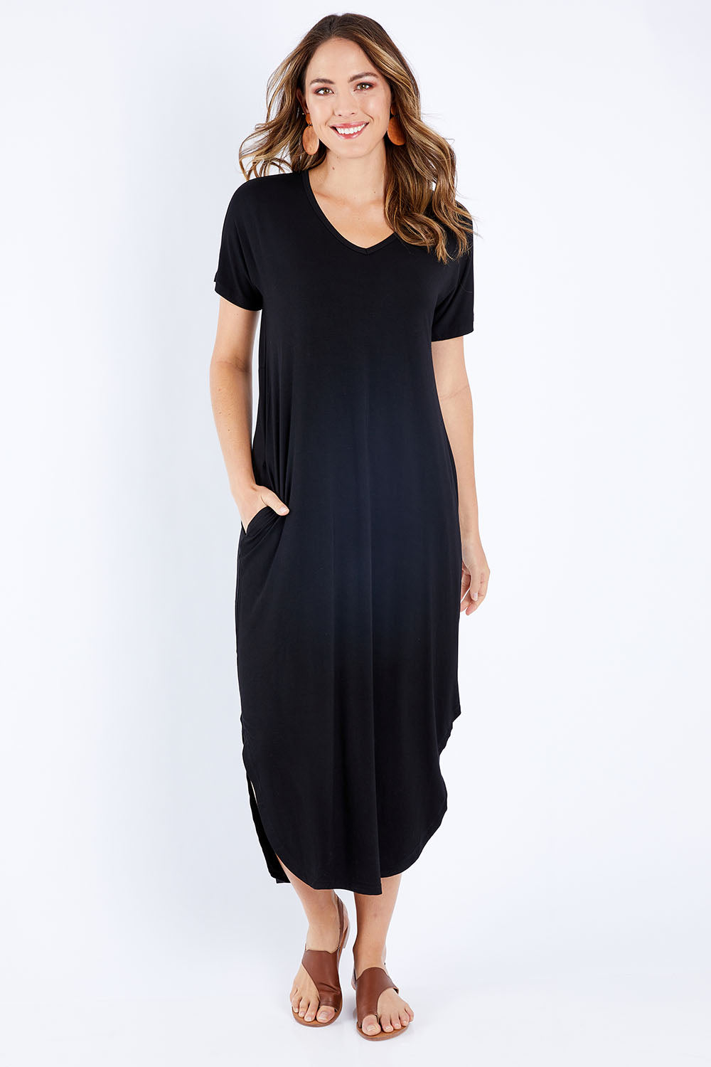Model Madeline wearing size 10 of The Cotton Blend Maxi in colour Black (Black), from the front, showing the whole outfit