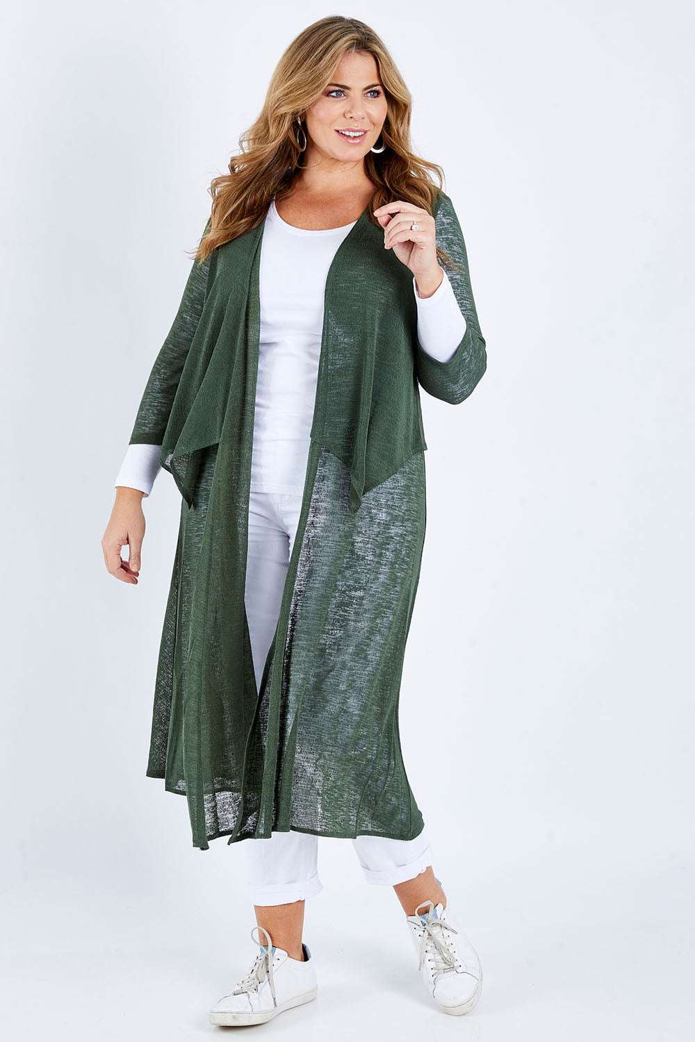 Model Fiona wearing size 16 of The Throw Over Duster Cardi in colour Khaki (Green), from the front, showing the whole outfit
