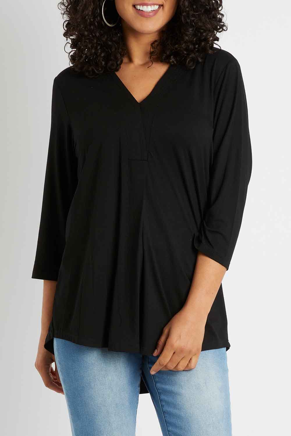 Model Pamela wearing size 10 of The Stitch Detail Top in colour Black (Black), from the front, cropped image