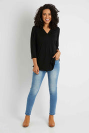 Model Pamela wearing size 10 of The Stitch Detail Top in colour Black (Black), from the front, showing the whole outfit