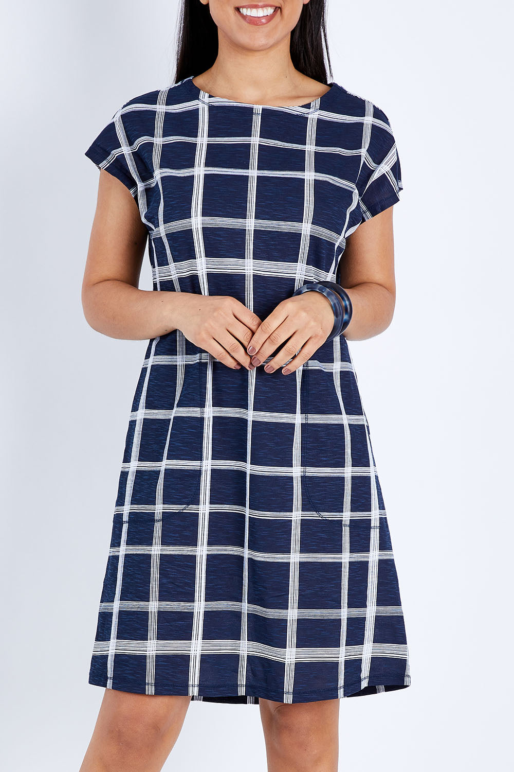 Model Pamela wearing size 10 of The Check Shift Dress in colour Navy (Blue), from the front, cropped image