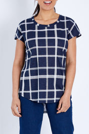 Model Pamela wearing size 10 of The Check Scoop Neck Tee in colour Navy (Blue), from the front, cropped image
