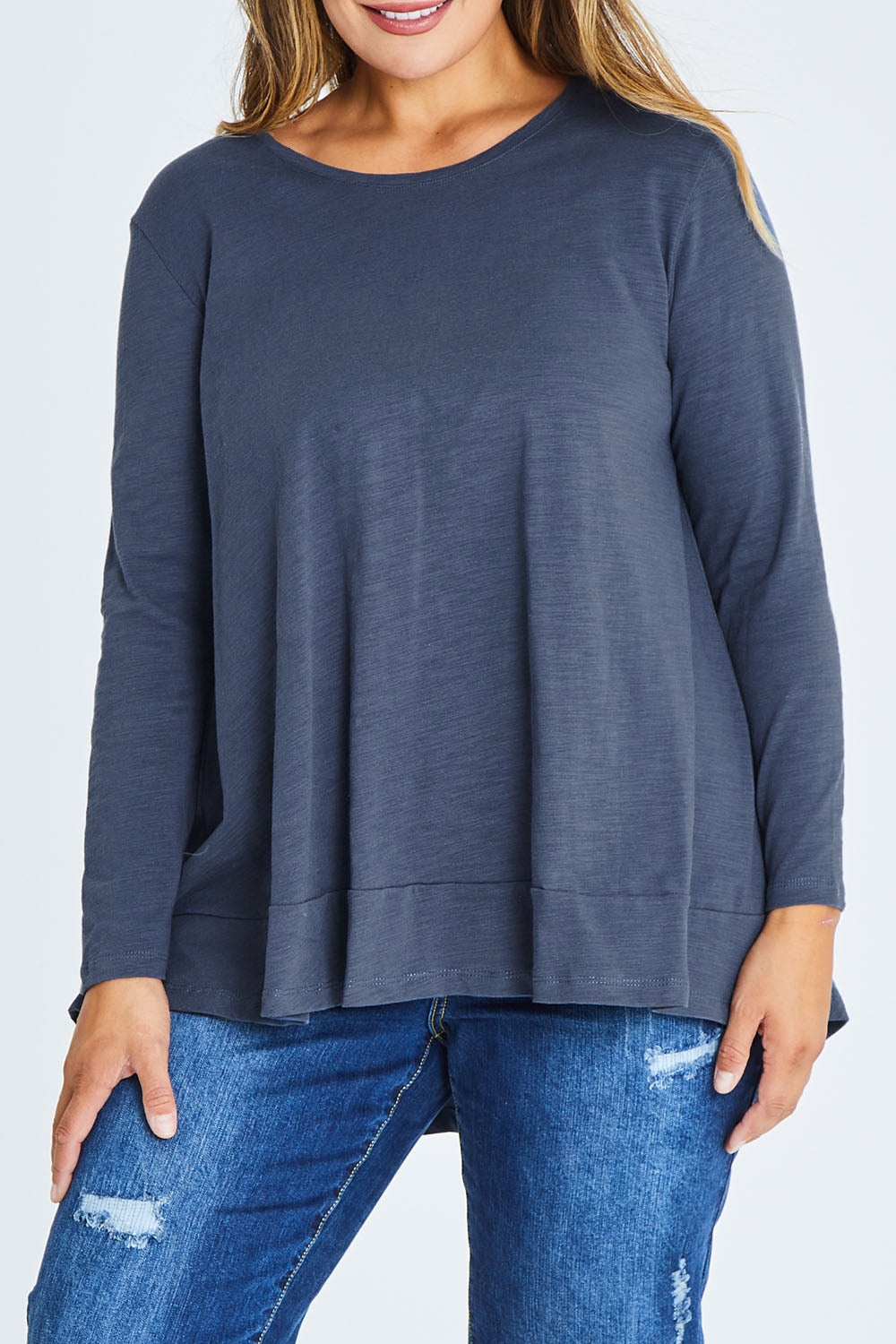 Model Palatina wearing size 16 of The Long Sleeve Swing Tee in colour Slate (Grey), from the front, cropped image